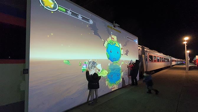 The interactive game zone is powered by two Christie DWU630-GS laser projectors