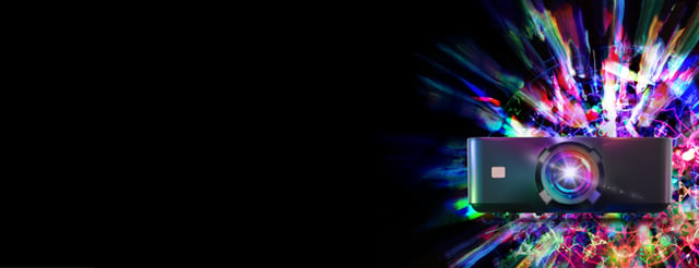 Korus projector with an multicolor explosion motif behind it.