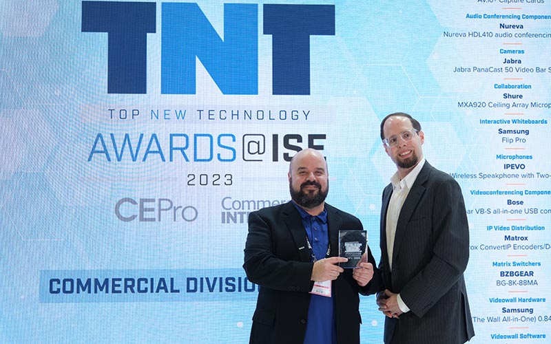 Joel St. Denis director, product management, accepts the 2023 Top New Technology (TNT) Award for the Griffyn® 4K50-RGB laser projector.