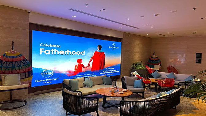 A Christie CorePlus LED video wall used for entertainment and digital signage in a hospitality environment.