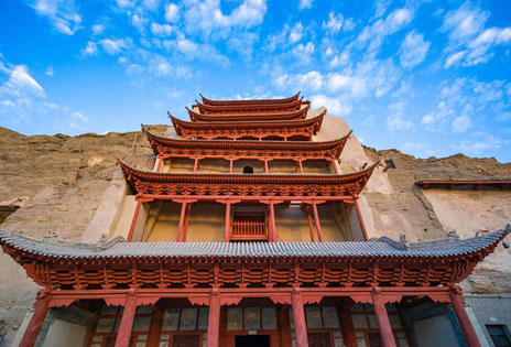 Looking from the ground up at a Chinese temple, with the sky at the top